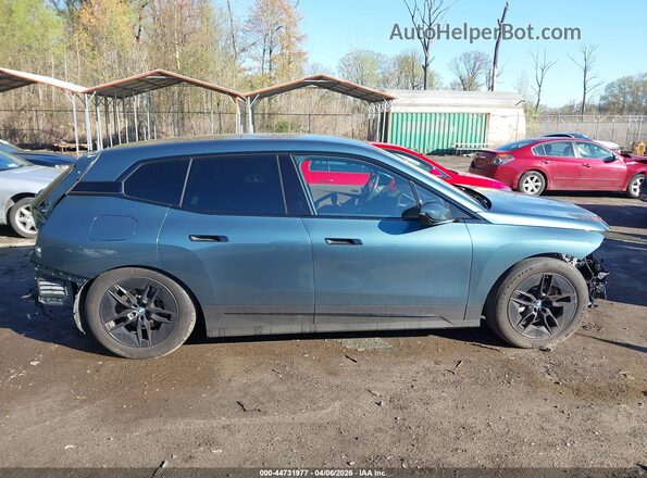 WB523CF09PCM08221 2023 BMW IX Light Blue Սալոնի հետևի տեսք