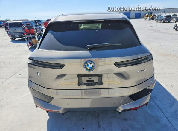 WB523CF09SCS71483 2025 BMW IX Silver Հետևի տեսք