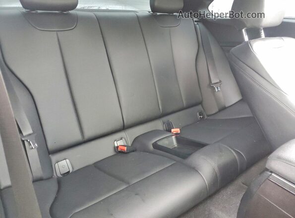 WBA1G9C51GV726357 2016 BMW 2 SERIES White Vista de los asientos traseros