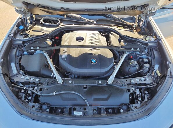 WBA23EH02RCT01525 2024 BMW 7 SERIES Gray Widok wnętrza z tyłu