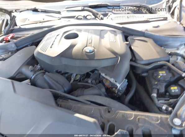 WBA2M7C08L7F19309 2020 BMW 2 SERIES White Vista trasera
