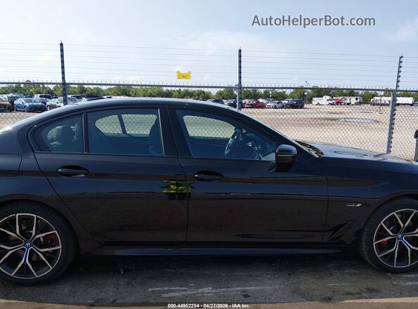 WBA33AG06PCN06857 2023 BMW 5 SERIES Black Вид задньої частини салону