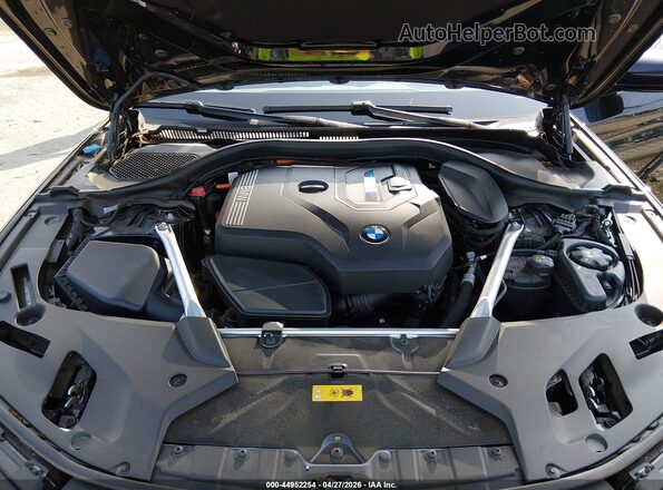 WBA33AG06PCN06857 2023 BMW 5 SERIES Black Вид ззаду