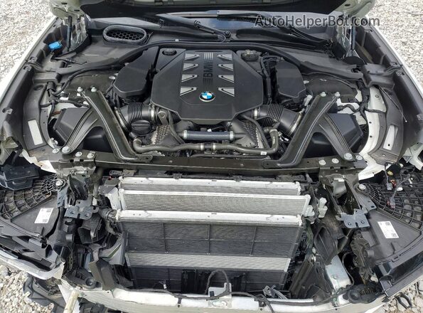 WBA33EJ07RCP85271 2024 BMW 7 SERIES White Vista interior trasera