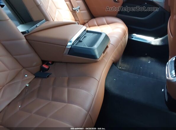 WBA33EJ09PCM85194 2023 BMW 7 SERIES Black Vista de la etiqueta del VIN