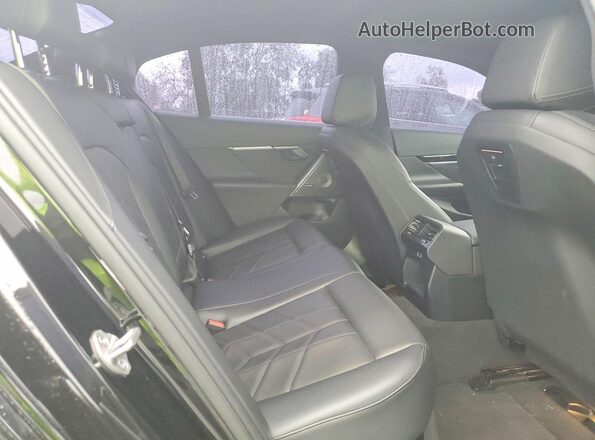 WBA43FJ02RCR24264 2024 BMW 5 SERIES Black Vista de los asientos traseros