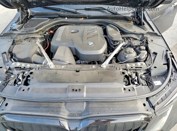 WBA43FJ02RCS66932 2024 BMW 5 SERIES Gray Widok wnętrza z tyłu