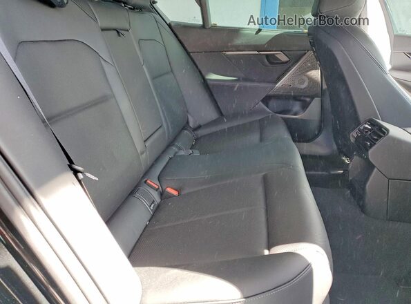 WBA43FJ04TCW41677 2026 BMW 5 SERIES Black Вид задніх сидінь