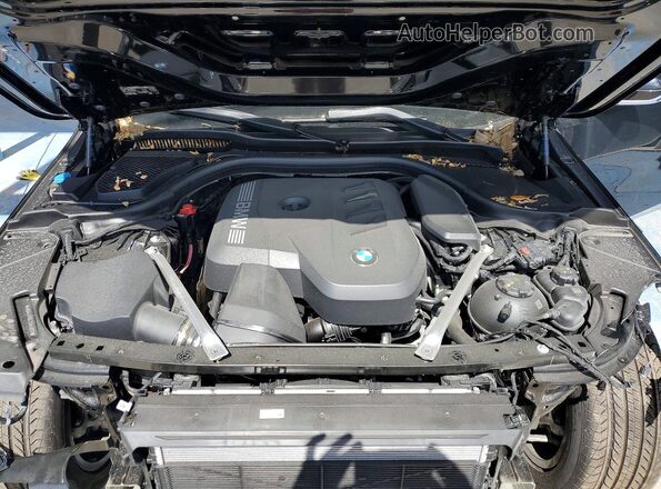 WBA43FJ04TCW41677 2026 BMW 5 SERIES Black Вид задньої частини салону