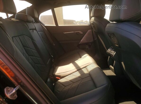 WBA43FJ05SCU59498 2025 BMW 5 SERIES Black Rear seats view