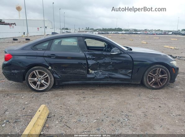 WBA4C9C58GG136752 2016 BMW 4 SERIES Black Vista interior trasera