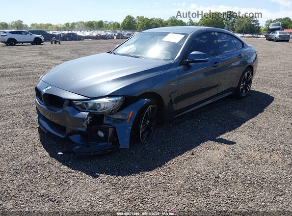 WBA4F9C32HG812782 2017 BMW 4 SERIES Gray Front left