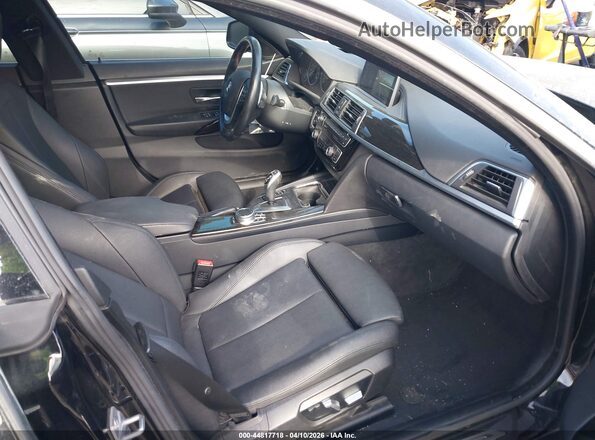 WBA4J1C07LBU67812 2020 BMW 4 SERIES Black წინა სალონის ხედი