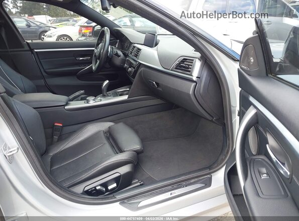 WBA4J3C56JBL04265 2018 BMW 4 SERIES Серебряный Вид салона спереди