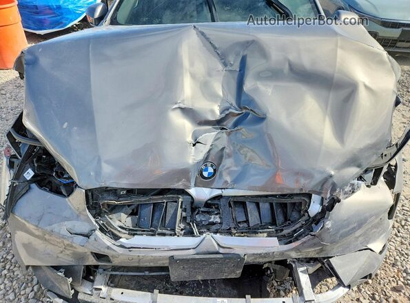 WBA53FJ00RCS45551 2024 BMW 5 SERIES Silver Вид задньої частини салону