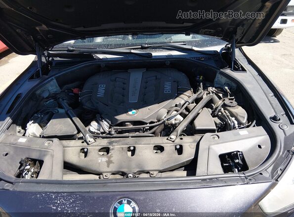 WBA5M0C50HD085280 2017 BMW 5 SERIES Черный Вид сзади