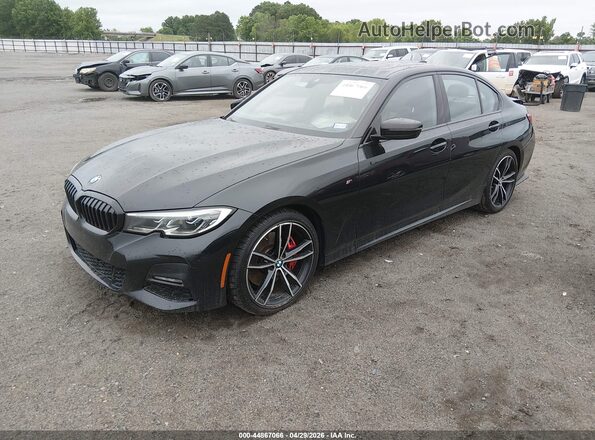 WBA5R7C08MFK81402 2021 BMW 3 SERIES Black Vista tres cuartos delantera izquierda