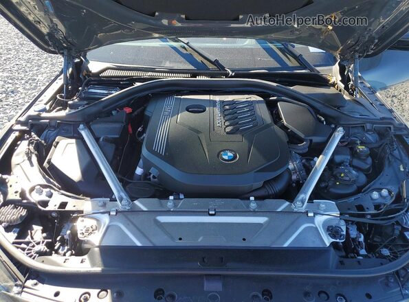 WBA63AT01PCL45451 2023 BMW M4 Серый Вид задней части салона