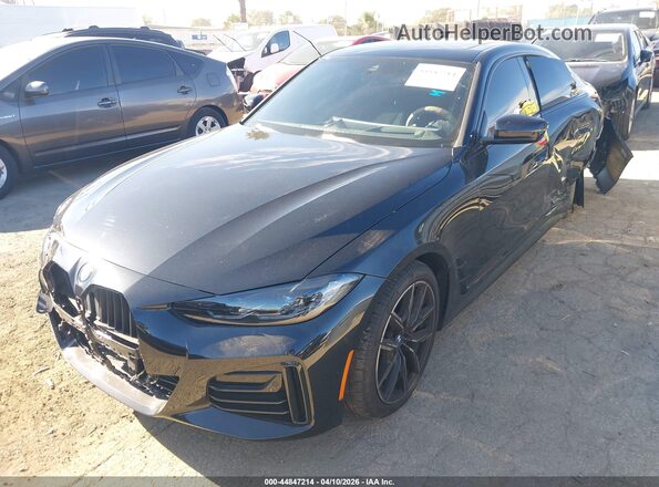 WBA63AV01RFR25619 2024 BMW 4 SERIES Black Առջևի ձախ երեք քառորդ տեսարան
