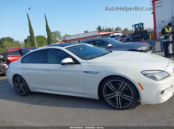 WBA6D0C53KG853084 2019 BMW 6 SERIES White Vista interior trasera