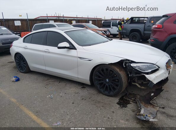 WBA6D6C59GGF94775 2016 BMW 6 SERIES Белый Вид задней части салона