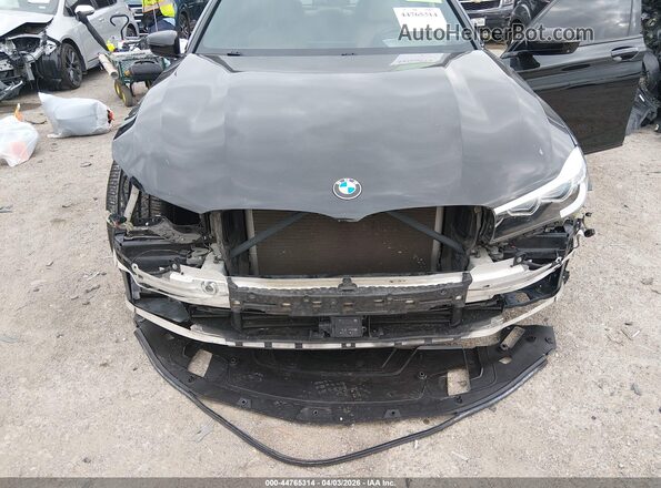 WBA7E2C57HG740535 2017 BMW 7 SERIES Black Вид спереду