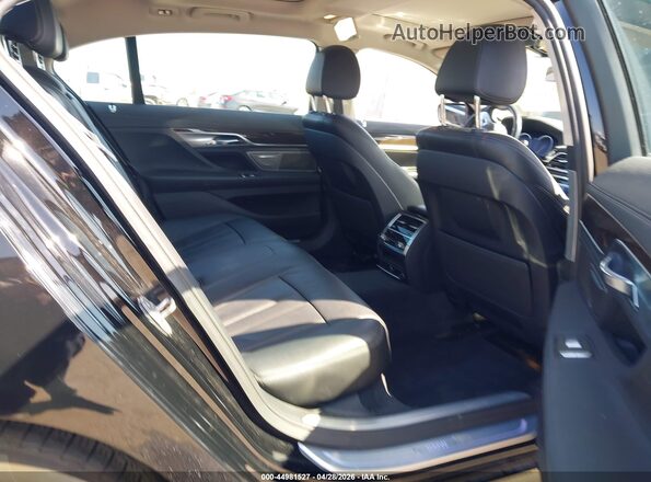 WBA7E2C58GG547616 2016 BMW 7 SERIES Black Widok naklejki z numerem VIN