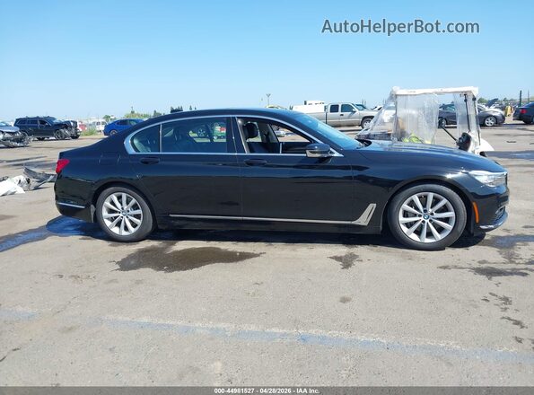 WBA7E2C58GG547616 2016 BMW 7 SERIES Black Widok wnętrza z tyłu