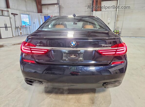 WBA7F2C58JG424130 2018 BMW 7 SERIES Синий Вид сзади