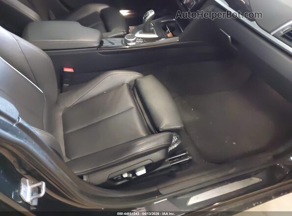 WBA8Z9C54JB219969 2018 BMW 3 SERIES Black Вид салону спереду