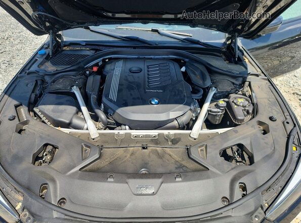 WBAGV2C01MCF98224 2021 BMW 8 SERIES Черный Вид задней части салона