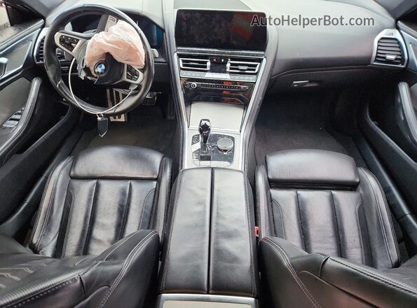 WBAGV2C01PCL65624 2023 BMW 8 SERIES White Vista del salpicadero