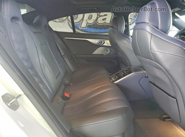 WBAGV4C03RCR23133 2024 BMW 8 SERIES White Rear seats view