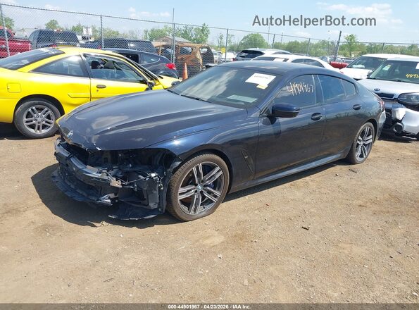 WBAGV4C06MCF00588 2021 BMW 8 SERIES Dark Blue Առջևի ձախ երեք քառորդ տեսարան