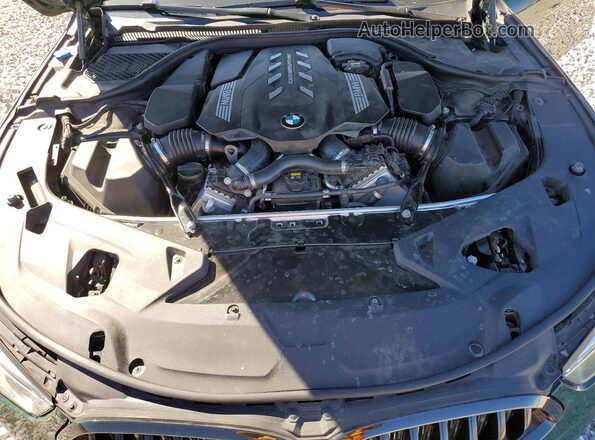 WBAGV8C00MCF83216 2021 BMW M8 Green უკანა სალონის ხედი