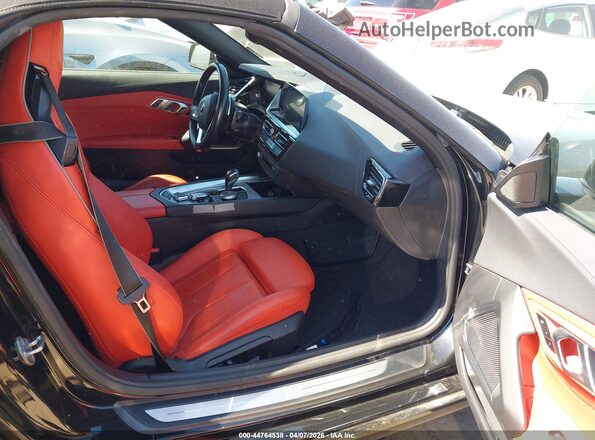 WBAHF3C06MWX32406 2021 BMW Z4 Black Vista interior delantera