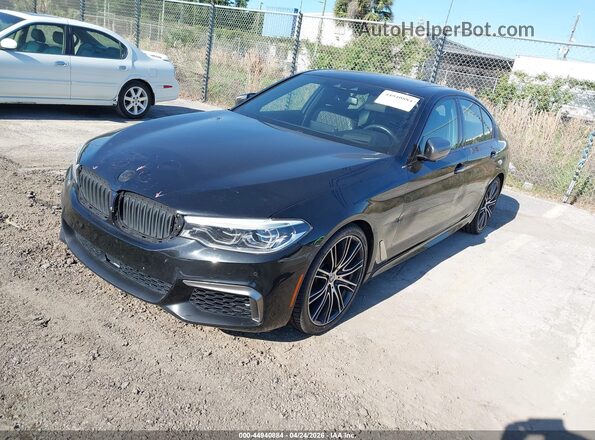 WBAJB9C51JB035160 2018 BMW 7 SERIES Black Vista tres cuartos delantera izquierda