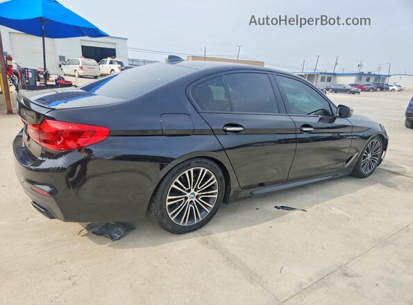 WBAJB9C56JB036627 2018 BMW M5 Black Trasero derecho