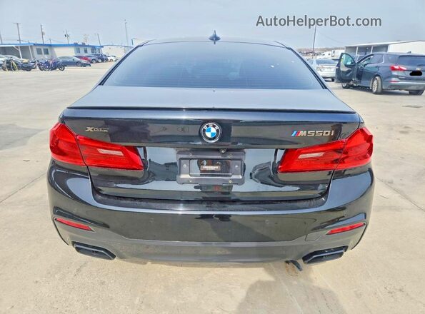 WBAJB9C56JB036627 2018 BMW M5 Black Vista trasera
