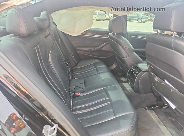 WBAJB9C56JB036627 2018 BMW M5 Black Vista de los asientos traseros