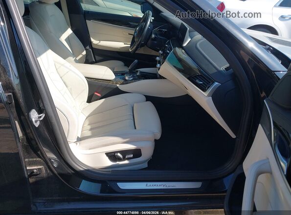 WBAJR3C0XLCE52029 2020 BMW 5 SERIES Black Front interior view