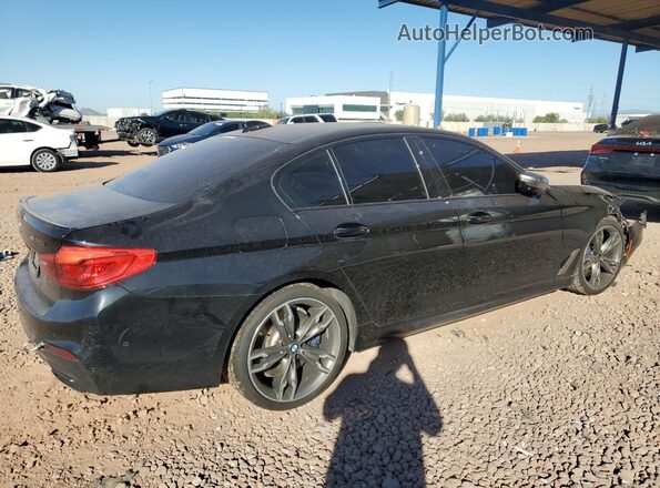 WBAJS7C06LCD81410 2020 BMW M5 Black Rear right