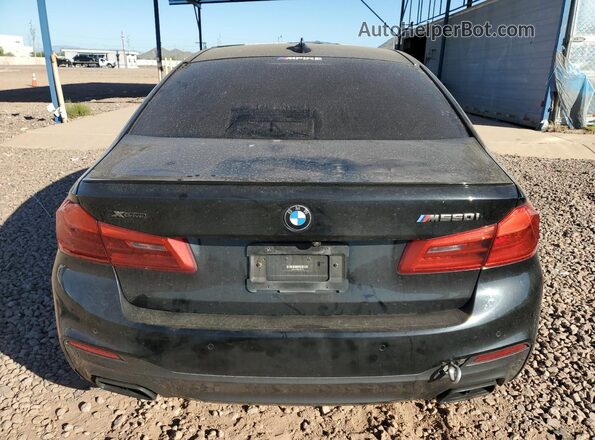 WBAJS7C06LCD81410 2020 BMW M5 Black Rear view