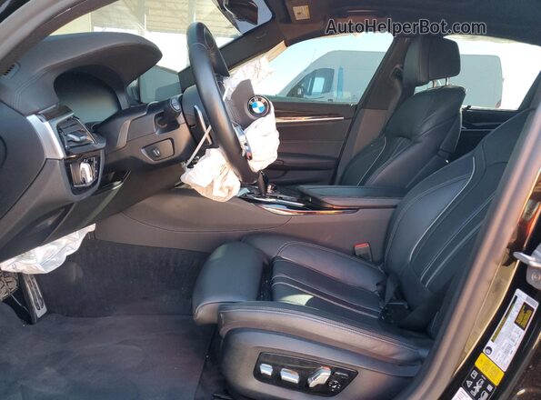 WBAJS7C06LCD81410 2020 BMW M5 Black Front interior view