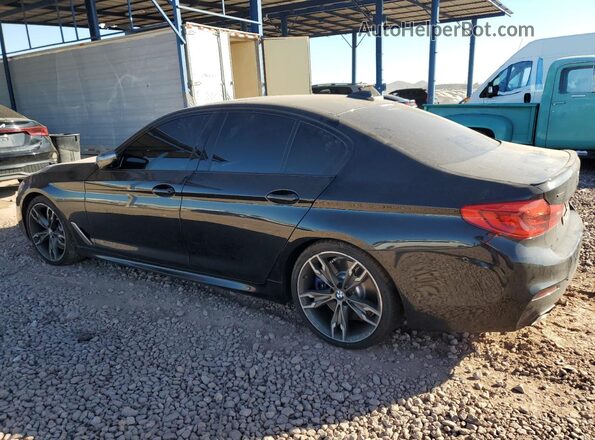 WBAJS7C06LCD81410 2020 BMW M5 Black Rear left