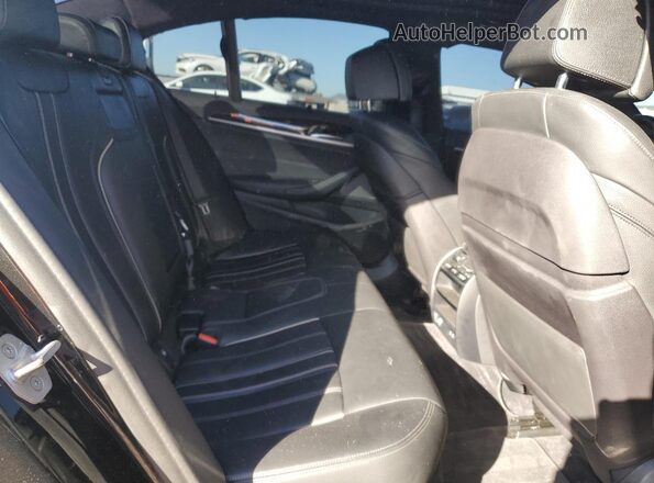 WBAJS7C06LCD81410 2020 BMW M5 Black Rear seats view