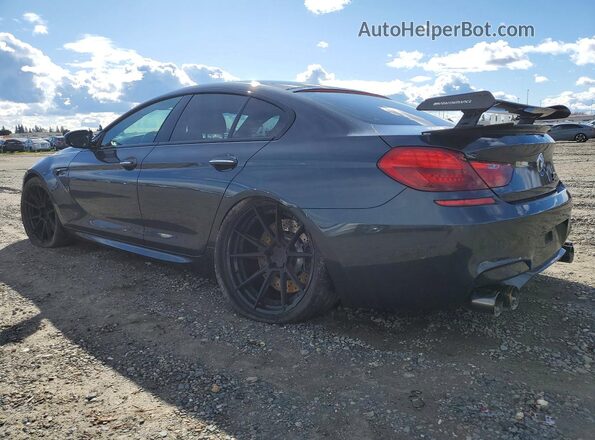 WBS6E9C52GG437192 2016 BMW M6 Gray Trasero izquierdo