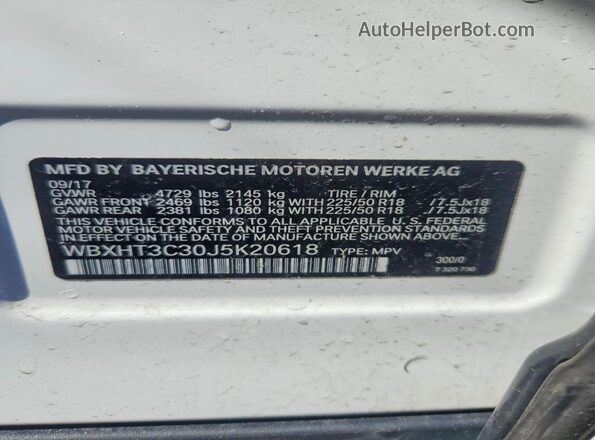 WBXHT3C30J5K20618 2018 BMW X1 White Engine compartment view