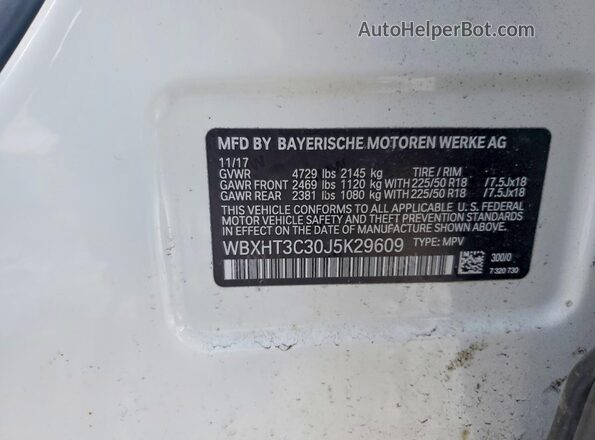 WBXHT3C30J5K29609 2018 BMW X1 White Вид наклейки з VIN-кодом