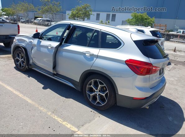 WBXHT3C31GP886433 2016 BMW X1 Серебряный Задняя левая четверть